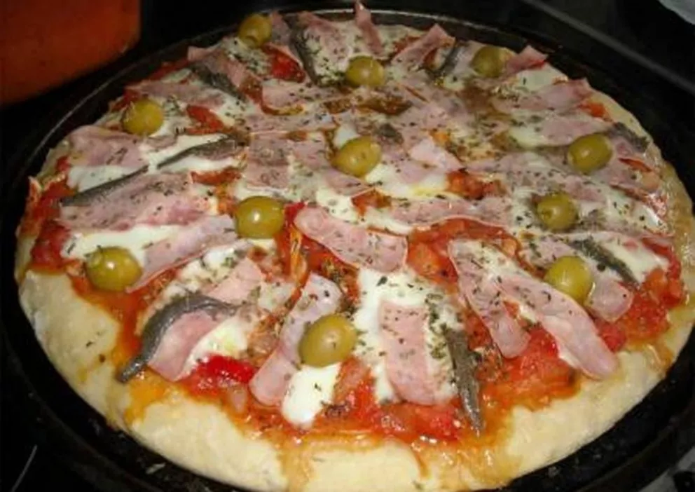 Elabora esta deliciosa receta de pizza.