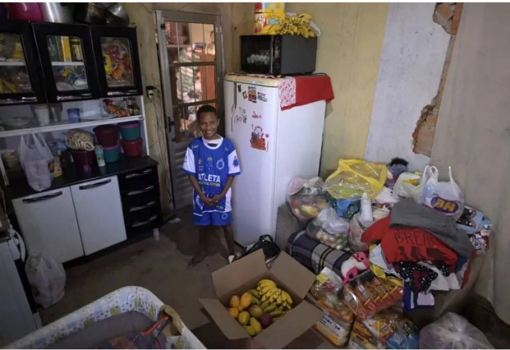 Miguelito, el niño que conmovió a un país porque llamó a la policía para informar que en su casa no tenían que comer. Foto: AFP