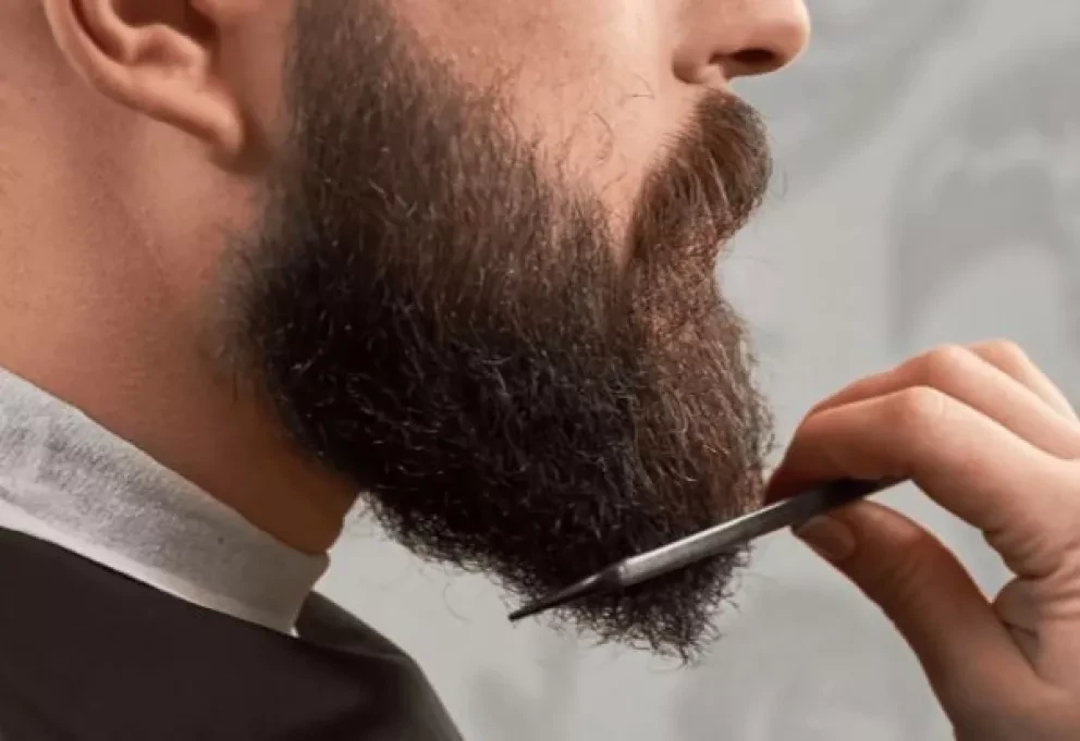 Sin barba, bigote, joyas ni corbata para poder volver a la oficina