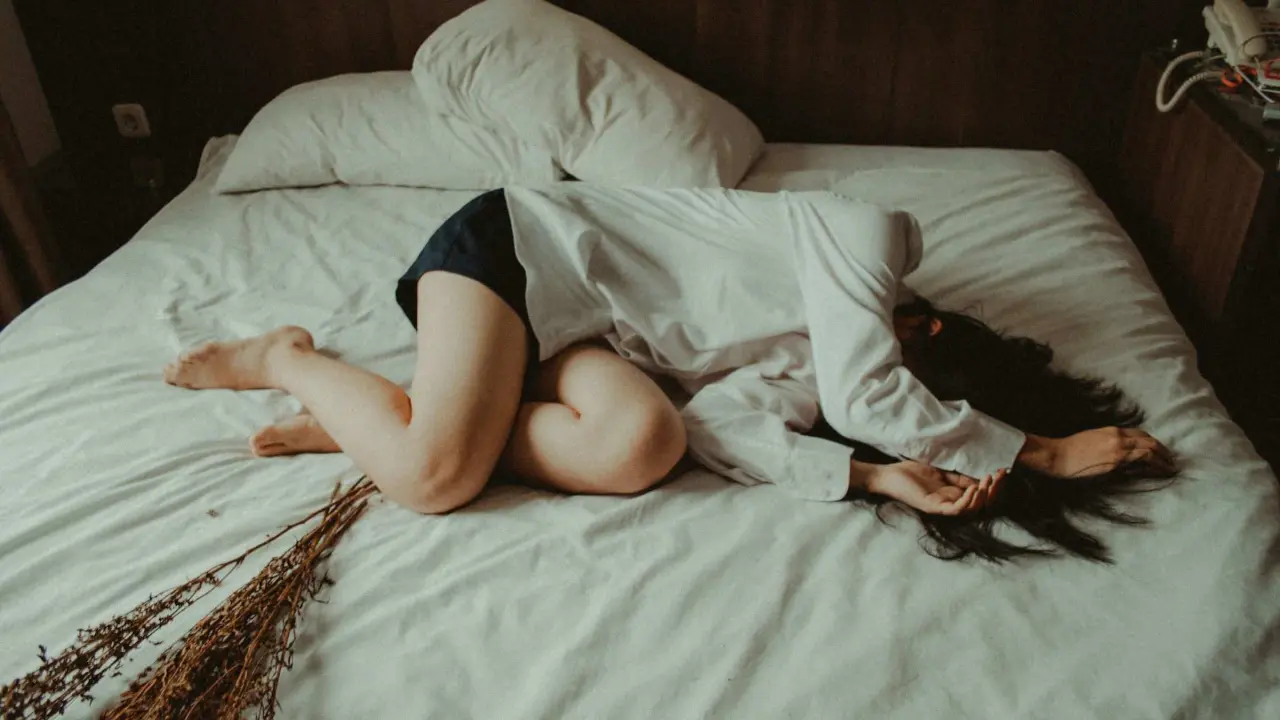 Mujer con dolor.