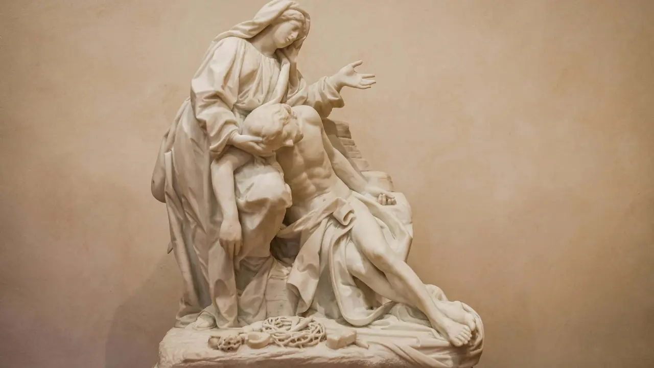 María bajando el cuerpo de Jesús.