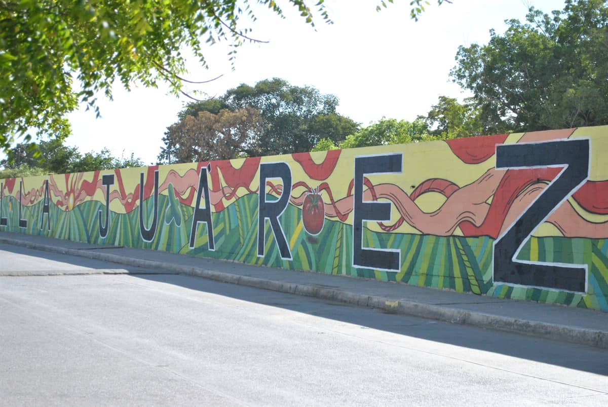 Maíz, hortalizas y un valle próspero en el mural de Villa Juárez