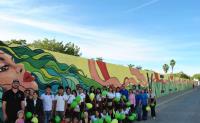 Jóvenes pintan el mural más largo de Sinaloa en Villa Juárez, Navolato