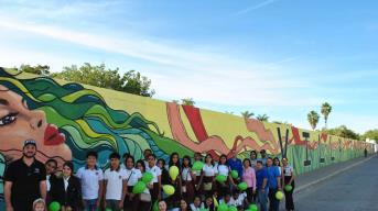 Jóvenes pintan el mural más largo de Sinaloa en Villa Juárez, Navolato