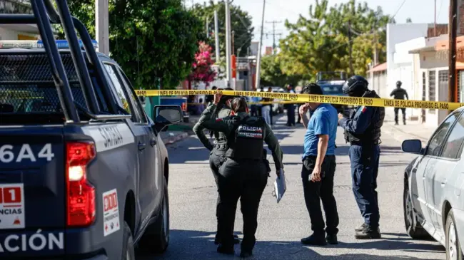 Policías Sinaloa cinta amarrilla