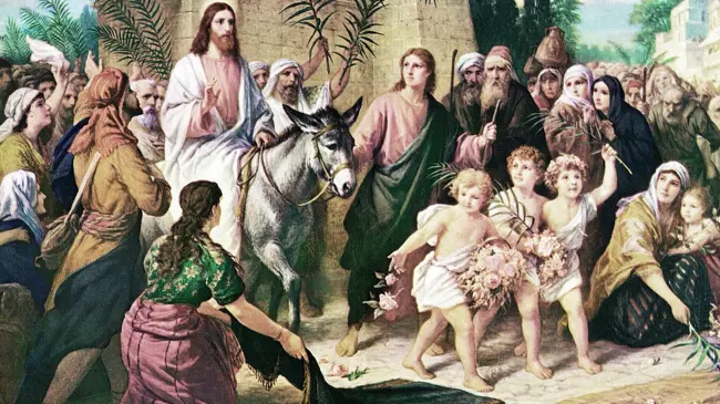 La imagen muestra a Jesús entrando a Jerusalen.