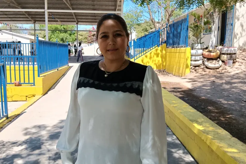 imagen recuadro El motor de la maestra Angélica en su carrera como docente son sus tres hijos: dos niños y una mujer.