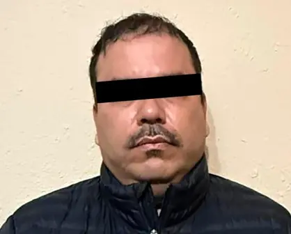 Así fue la captura de José Antonio "N" en Tijuana, Baja California, le decomisan armas largas, pastillas y 15 kilos de droga
