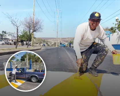 "Hasta donde tope": Con brocha en mano y corazón firme, Ángel transforma topes en seguridad vial en Culiacán