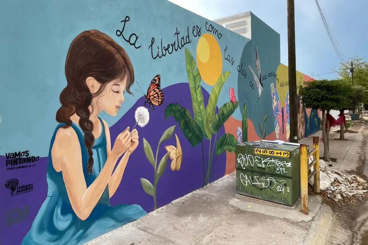 Creer en ti mismo es el primer aleteo hacia la libertad. Como una mariposa, solo necesitas valor para desplegar tus alas y descubrir que siempre has podido volar, es el mensaje que encierra el mural.