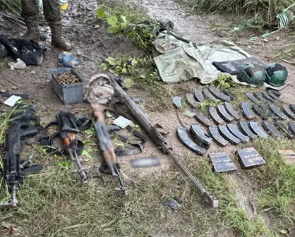 Fuerte arsenal asegurado en Culiacán con droga y vehículos con blindaje artesanal