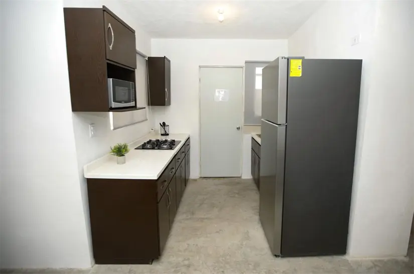 El área de cocina de las casas de Infonavit a través del programa de Viviendas del Bienestar. Foto: Cortesía