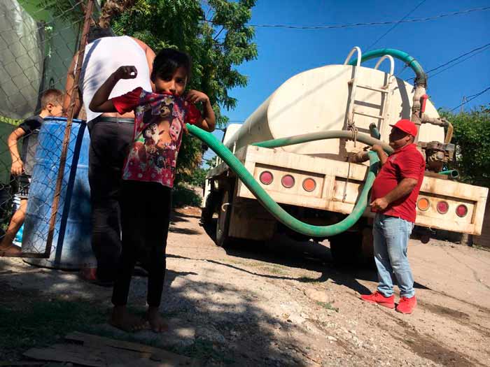 agua a colonias de Villas de Juárez